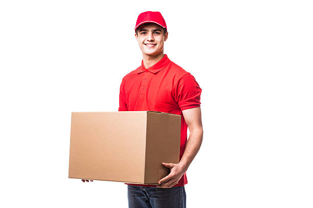 istock Side view of delivery man with box 639629470