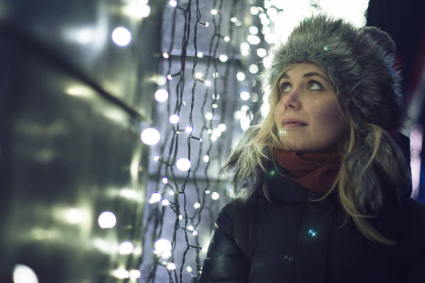 istock woman watching the city lights 639629842