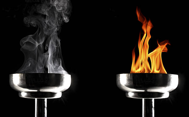 istock smokey and burning flaming torches 639630182