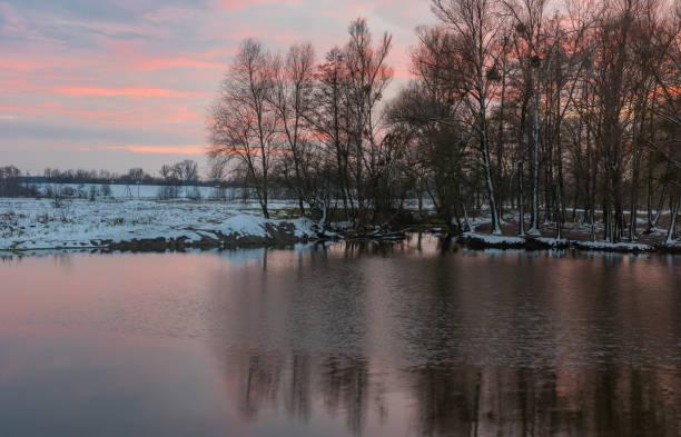 istock Landscape with small river Hrun' at winter sunset time 639632626