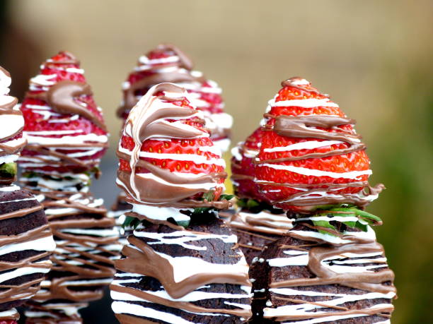 Strawberry Skewers Strawberry and Brownie Skewers drizzled with chocolate chocolate white chocolate chocolate chip white stock pictures, royalty-free photos & images
