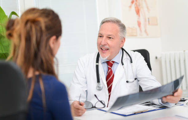 istock Doctor talking to a patient 639635894