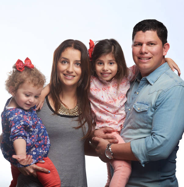 istock Family of four smiling 639636220