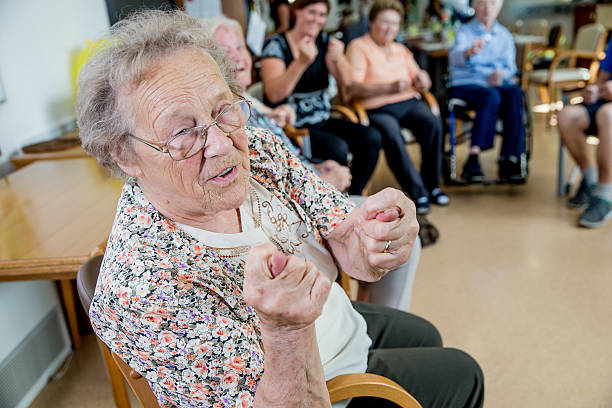 istock Active Seniors Exercising together in an Elderly Daycare Center 639636372