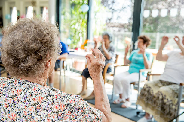 istock Active Seniors Exercising together in an Elderly Daycare Center 639637160