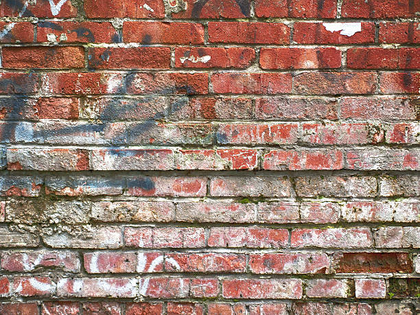 istock Grunge red dirty brick wall underground texture 639637952