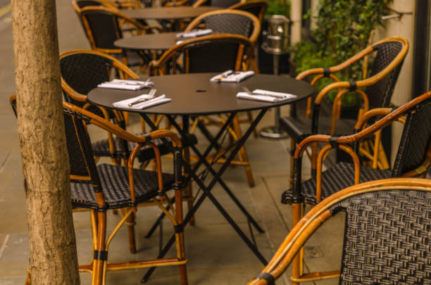 istock Table with wicker chairs on the front of the restaurant 639641136