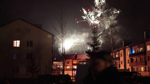 istock fireworks in the night sky over houses 639641274