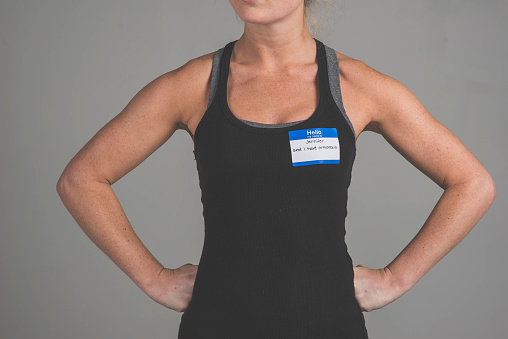A single person in a studio wearing a nametag with a label about ORTHOREXIA