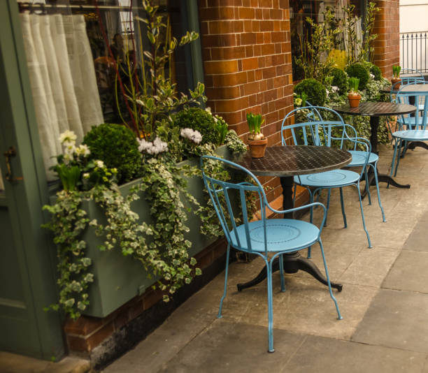 istock Table with blue chairs in front of restaurant 639643140