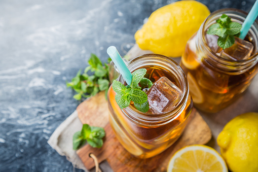 Iced tea in glass jars, copy space