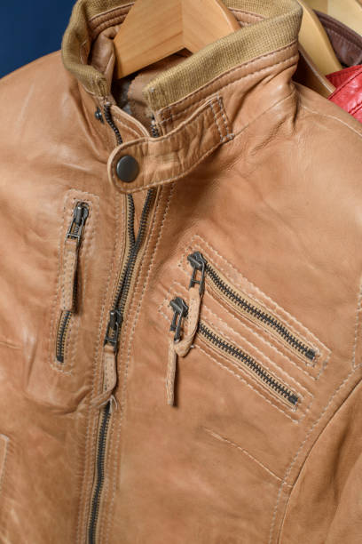 istock Light brown leather jacket. Beige color leather jacket on hanger 639643450