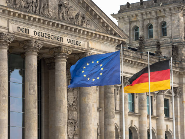 istock Reichstag in Berlin with EU flag and german flag 639643582