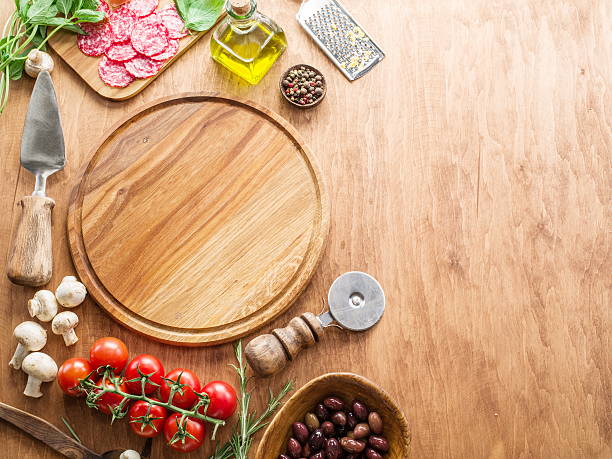 istock Pizza with mushrooms, salami and tomatoes. 639646584