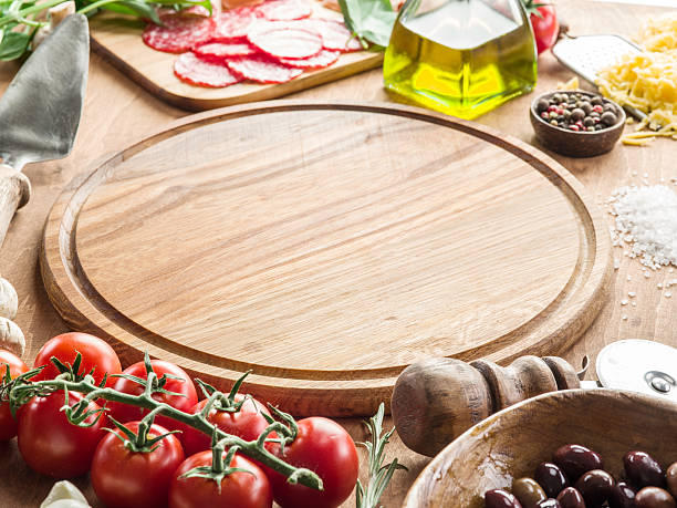 istock Pizza with mushrooms, salami and tomatoes. 639646614