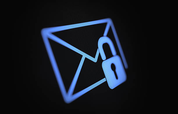 Internet and E-Mail Security Concept on Black Digital Screen Internet and e mail security concept on lack digital screen. Blue At sign is being protected by  a padlock. Horizontal composition with copy space. Clipping path is included. Email Privacy stock pictures, royalty-free photos & images