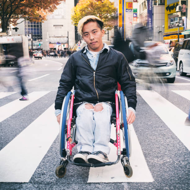 istock Japanese Man in Wheelchair 639647670