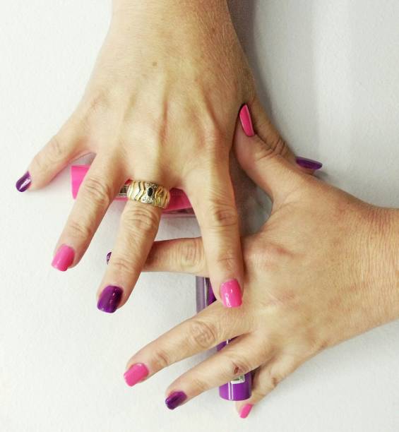 istock Pink and purple nails 639649934
