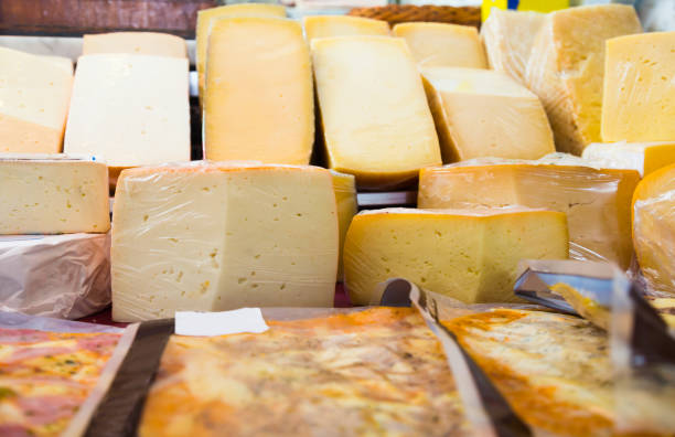 cheese assortment on market - cheese counter supermarket bildbanksfoton och bilder