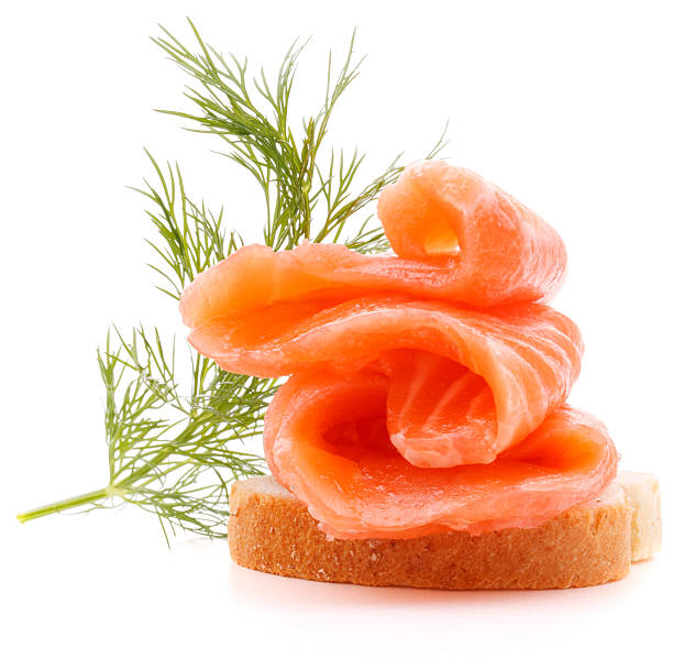 istock sandwich or canape with salmon on white background  cutout 639653548