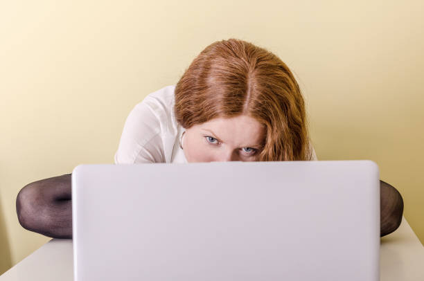 istock girl lying on the coffee table and stretches his back 639654188