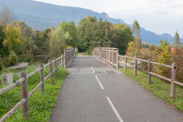 istock road with wooden bridge 639654582
