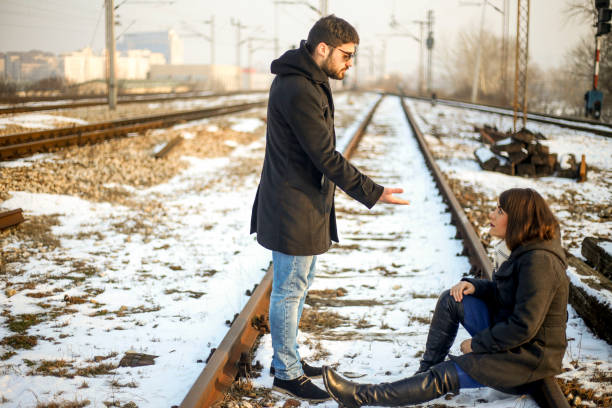 istock Young couple on railroad 639656168