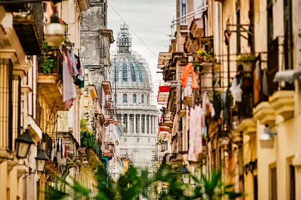 View of Havana Capitol Building from the narrow streets of Old Havana, Cuba.