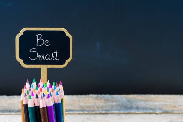 istock Wooden mini blackboard label with message BE SMART 639664624