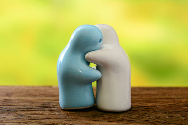 istock Ceramic doll feeling hug on wooden and nature background 639667510