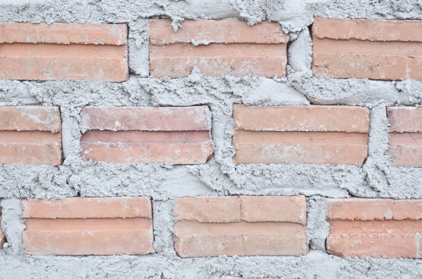 istock New brick tile wall background and texture 639668350
