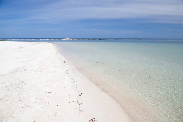 istock Perfect deserted white sand beach with the tropical sea 639670902