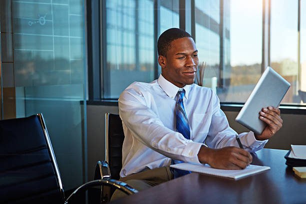 istock Boosting his productivity with the help of technology 639672894