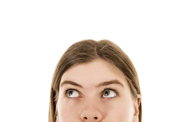 istock Young woman looking up 639673096