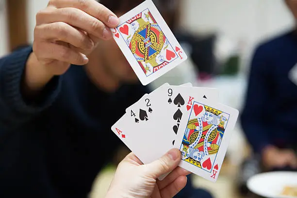 Japanese people playing card game