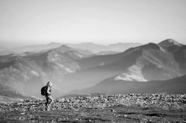 istock Tourists is walking on mountain plato with backpack on 639681430