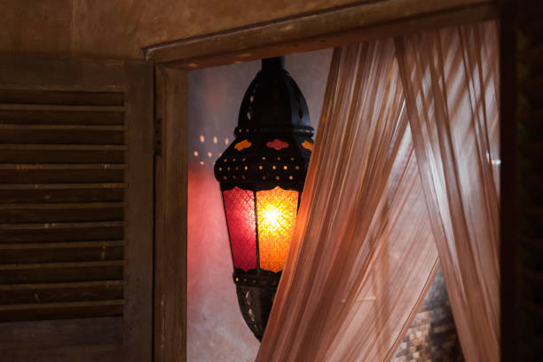 istock Vintage metal lamp inside room with warm light 639682192