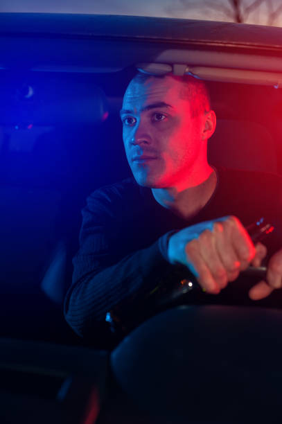 istock Drunk driver chased by police while driving car 639682736