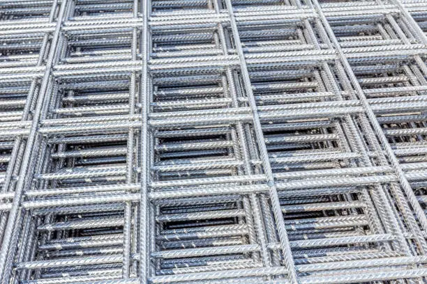 Photo of Pile of reinforcing mesh, armature, background, pattern