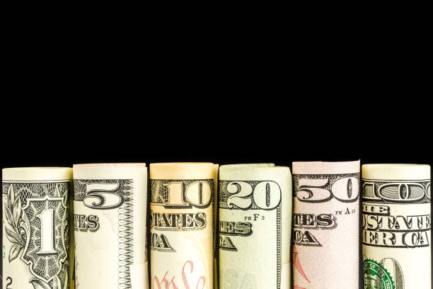 istock rolls of american dollar banknotes in one row 639685014