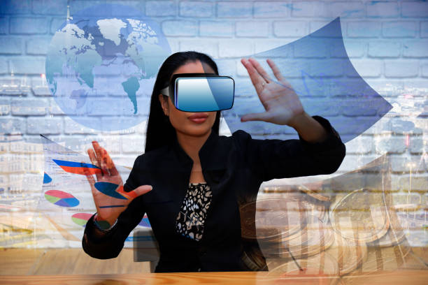 istock Businesswoman wearing a three-dimensional glasses working techno 639687094