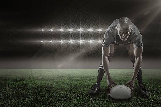 istock Composite image of rugby player holding ball  3d 639687584