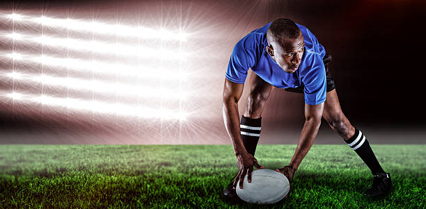 istock Composite image of rugby player holding ball 3d 639687630