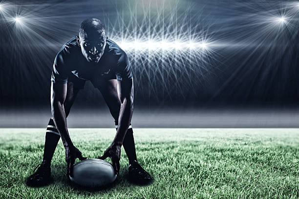 istock Composite image of rugby player holding ball 3d 639687722
