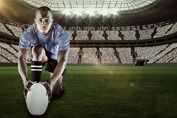 istock Composite image of rugby player holding ball 3d 639687806