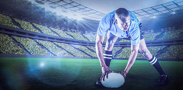 istock Composite image of rugby player holding ball 3d 639687862