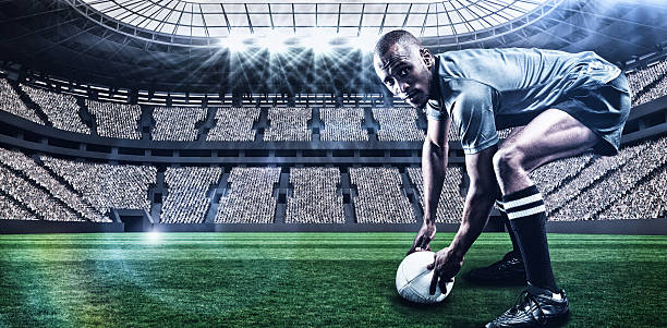istock Composite image of rugby player holding ball with 3d 639687872