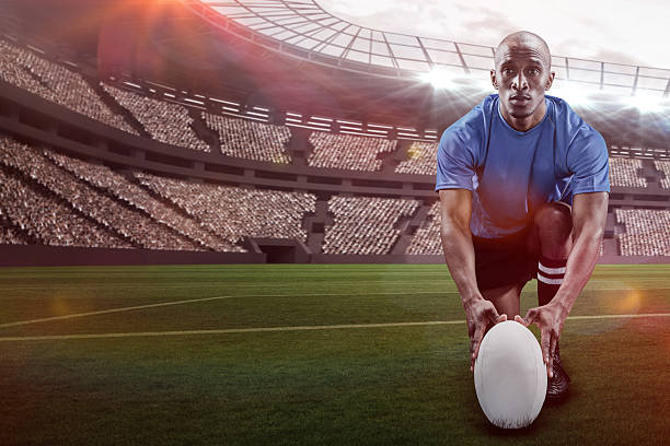 istock Composite image of rugby player holding ball with 3d 639687936