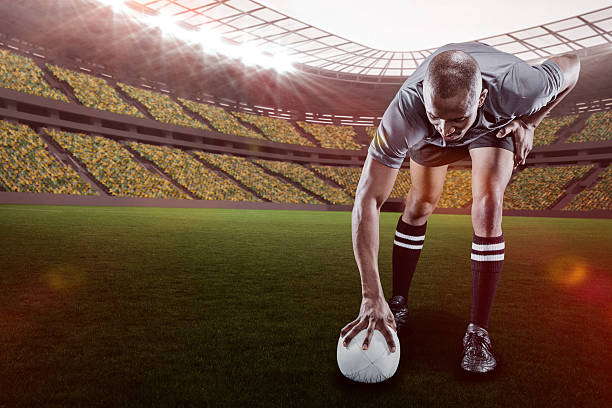 istock Composite image of rugby player taking position with 3d 639687966