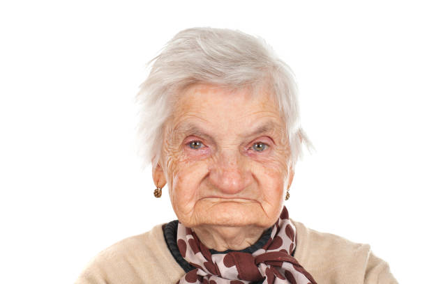 senior woman smiling at camera. Face of a happy senior woman in her 70s